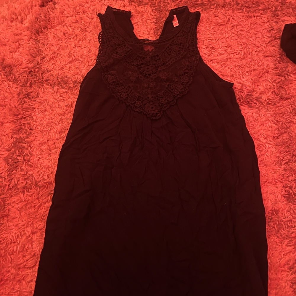 A dress that goes to right above the knee! Very cute details.